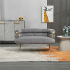 Sillón decorativo tapizado en terciopelo con patas de metal