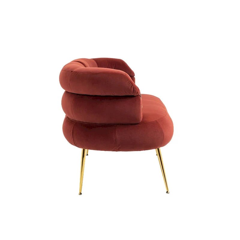 Sillón decorativo tapizado en terciopelo con patas de metal