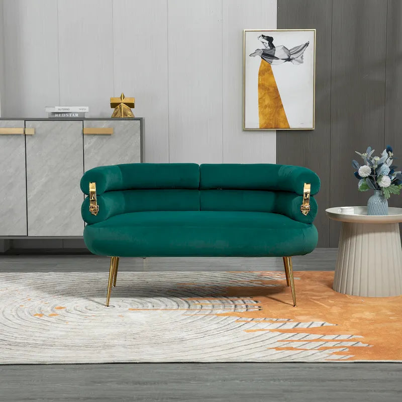 Sillón decorativo tapizado en terciopelo con patas de metal