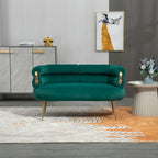 Sillón decorativo tapizado en terciopelo con patas de metal