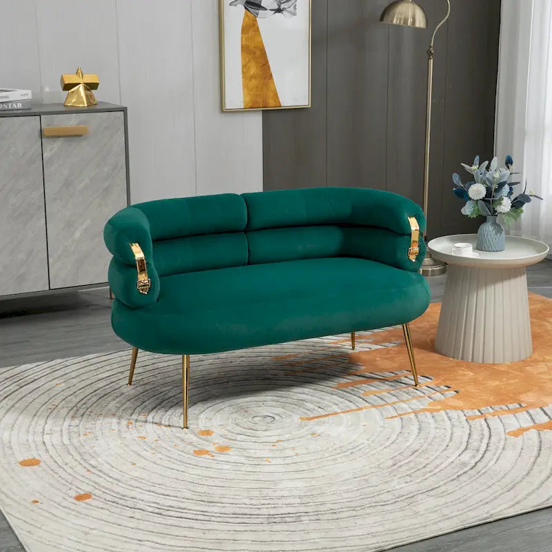 Sillón decorativo tapizado en terciopelo con patas de metal