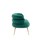 Sillón decorativo tapizado en terciopelo con patas de metal