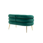 Sillón decorativo tapizado en terciopelo con patas de metal