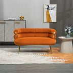 Sillón decorativo tapizado en terciopelo con patas de metal