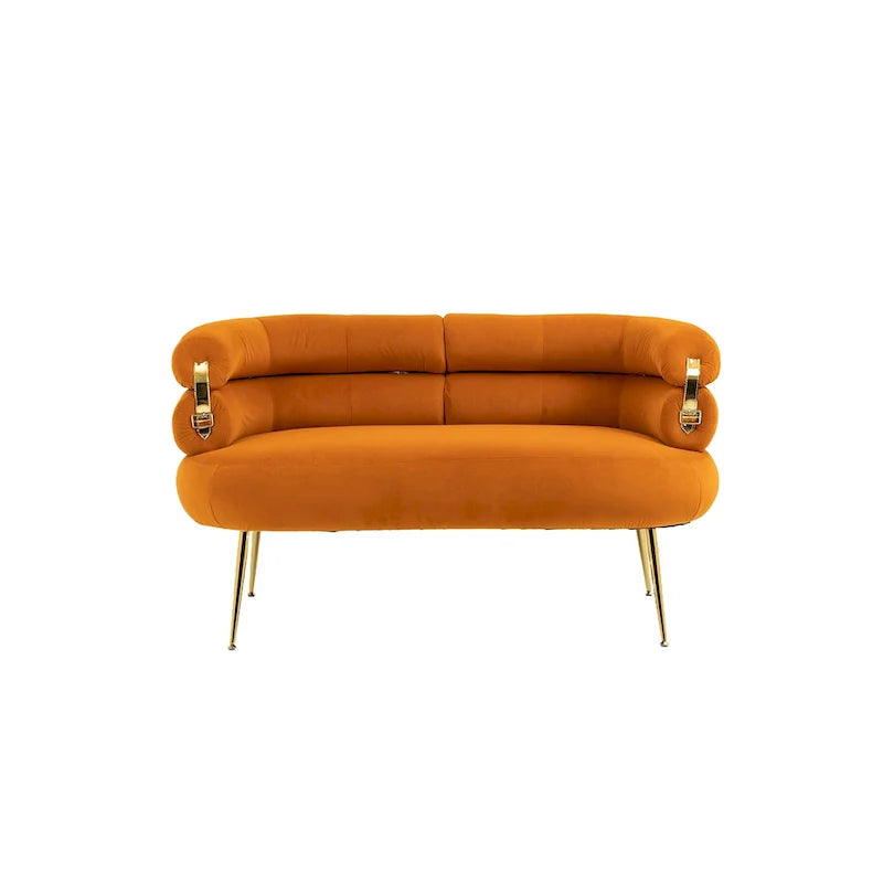 Sillón decorativo tapizado en terciopelo con patas de metal