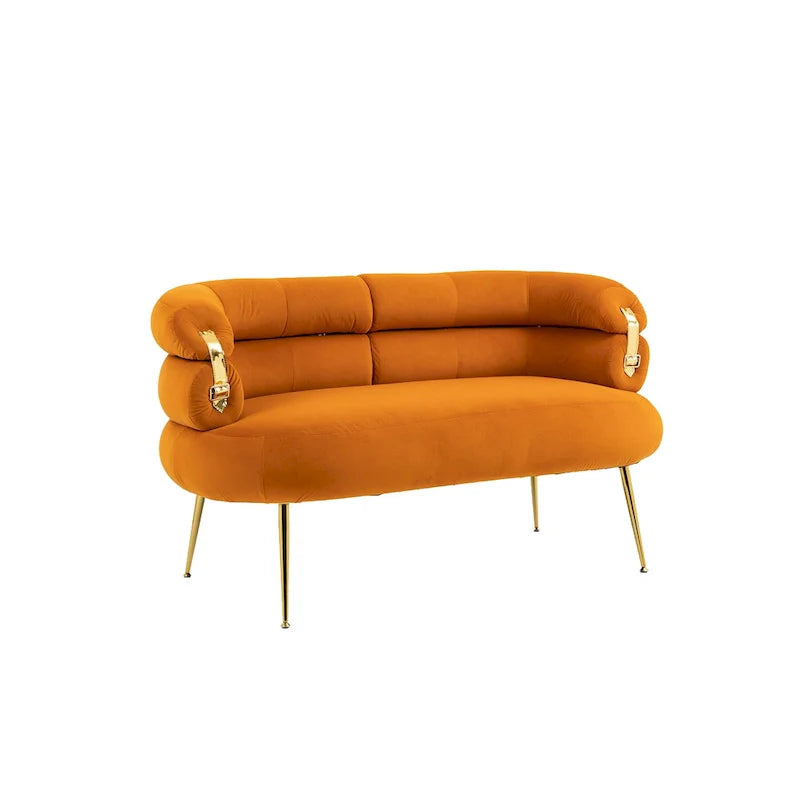 Sillón decorativo tapizado en terciopelo con patas de metal