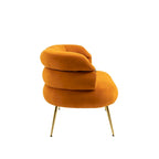 Sillón decorativo tapizado en terciopelo con patas de metal