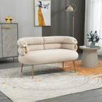 Sillón decorativo tapizado en terciopelo con patas de metal