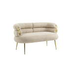 Sillón decorativo tapizado en terciopelo con patas de metal