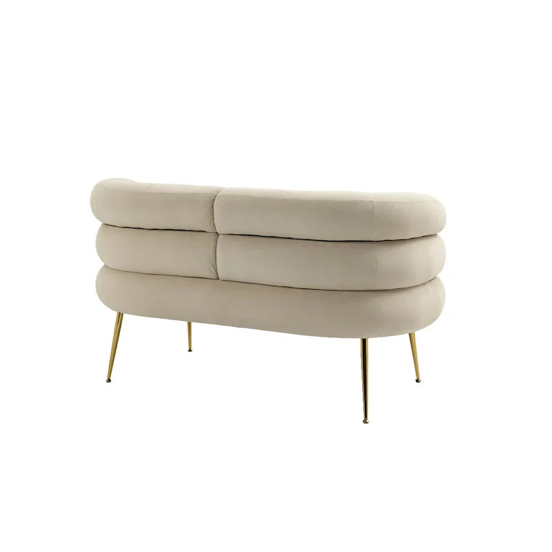 Sillón decorativo tapizado en terciopelo con patas de metal