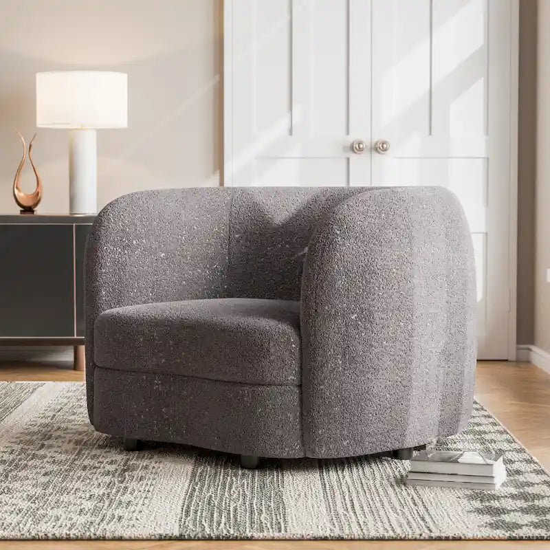 Sillón auxiliar de bucle con brazos curvos modernos, asiento estilo riñón y patas de madera redondas