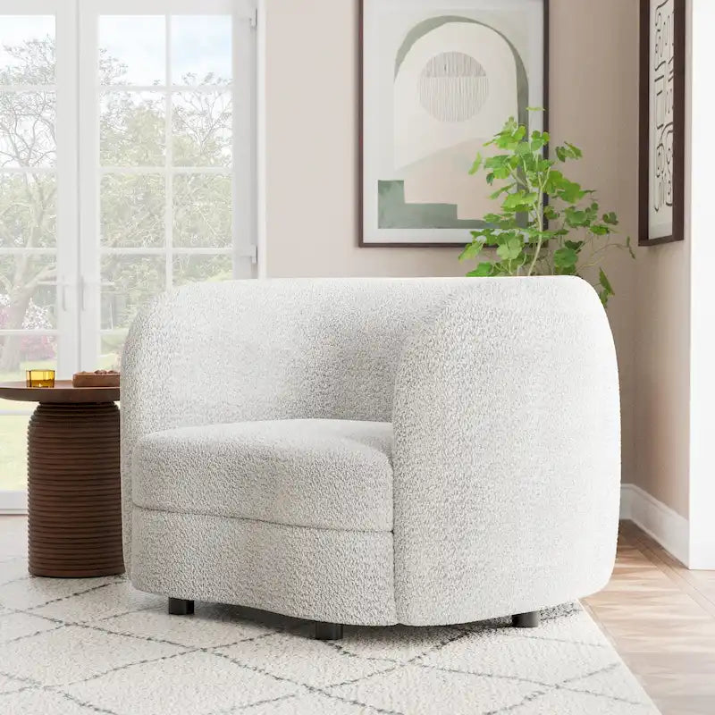 Sillón auxiliar de bucle con brazos curvos modernos, asiento estilo riñón y patas de madera redondas