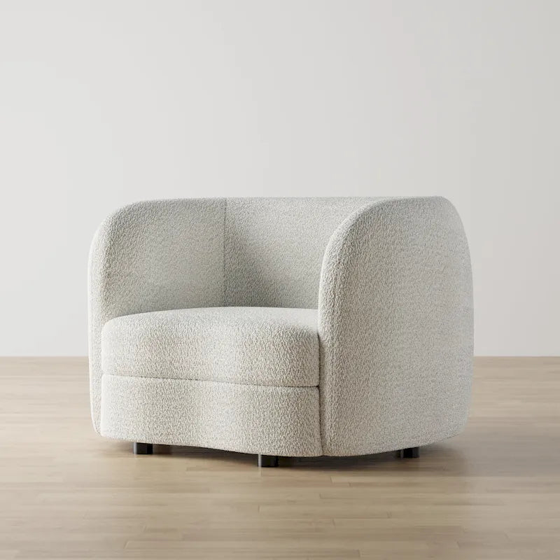 Sillón auxiliar de bucle con brazos curvos modernos, asiento estilo riñón y patas de madera redondas