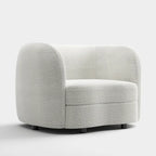 Sillón auxiliar de bucle con brazos curvos modernos, asiento estilo riñón y patas de madera redondas