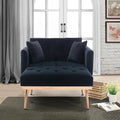 Sillón individual tipo barril con acolchado de espuma y tapicería de terciopelo