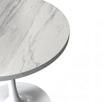 Mesa de comedor redonda con tablero de resina y pedestal de acero blanco